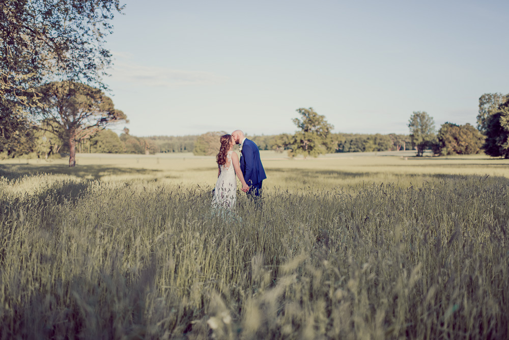 Natural wedding portraits of bride and groom at St Giles house Dorset