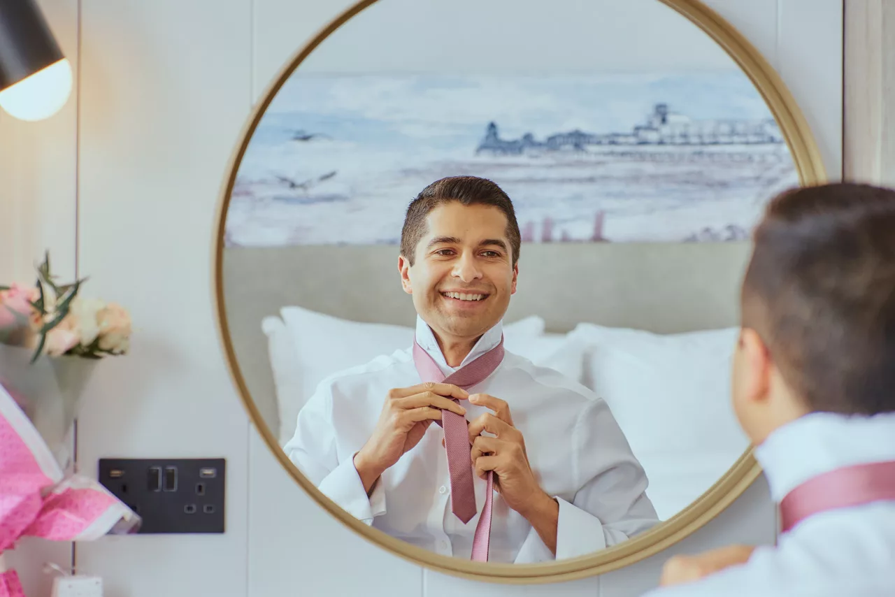 Groom Prep, at an Indian Fusion Wedding at Highcliffe Castle in Dorset