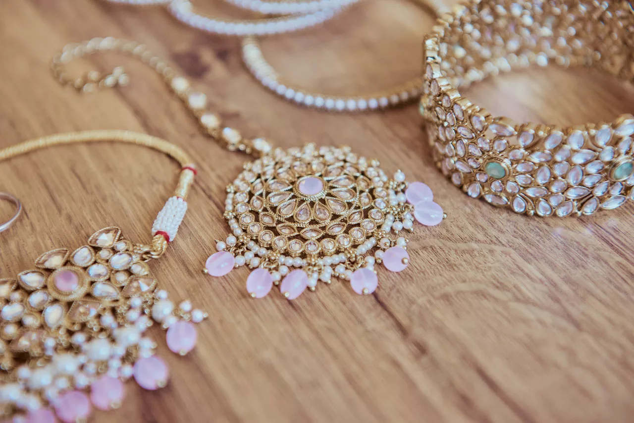 Brides Jewellery during Bridal Prep, at an Indian Fusion Wedding at Highcliffe Castle in Dorset