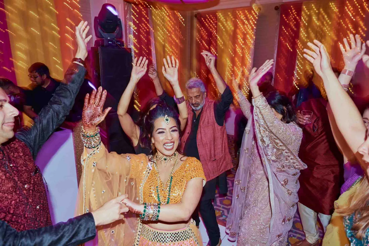 Bride With guests during Sangeet in Dorset