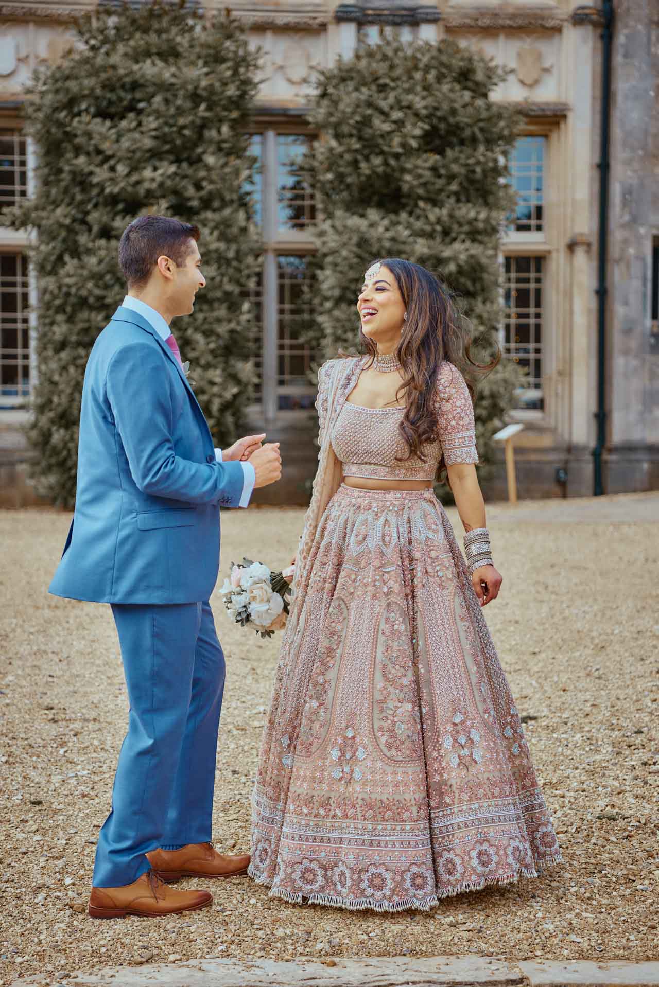 Bride & Groom in the grounds of Highcliffe Castle in Dorset during an  Indian Fusion Wedding.