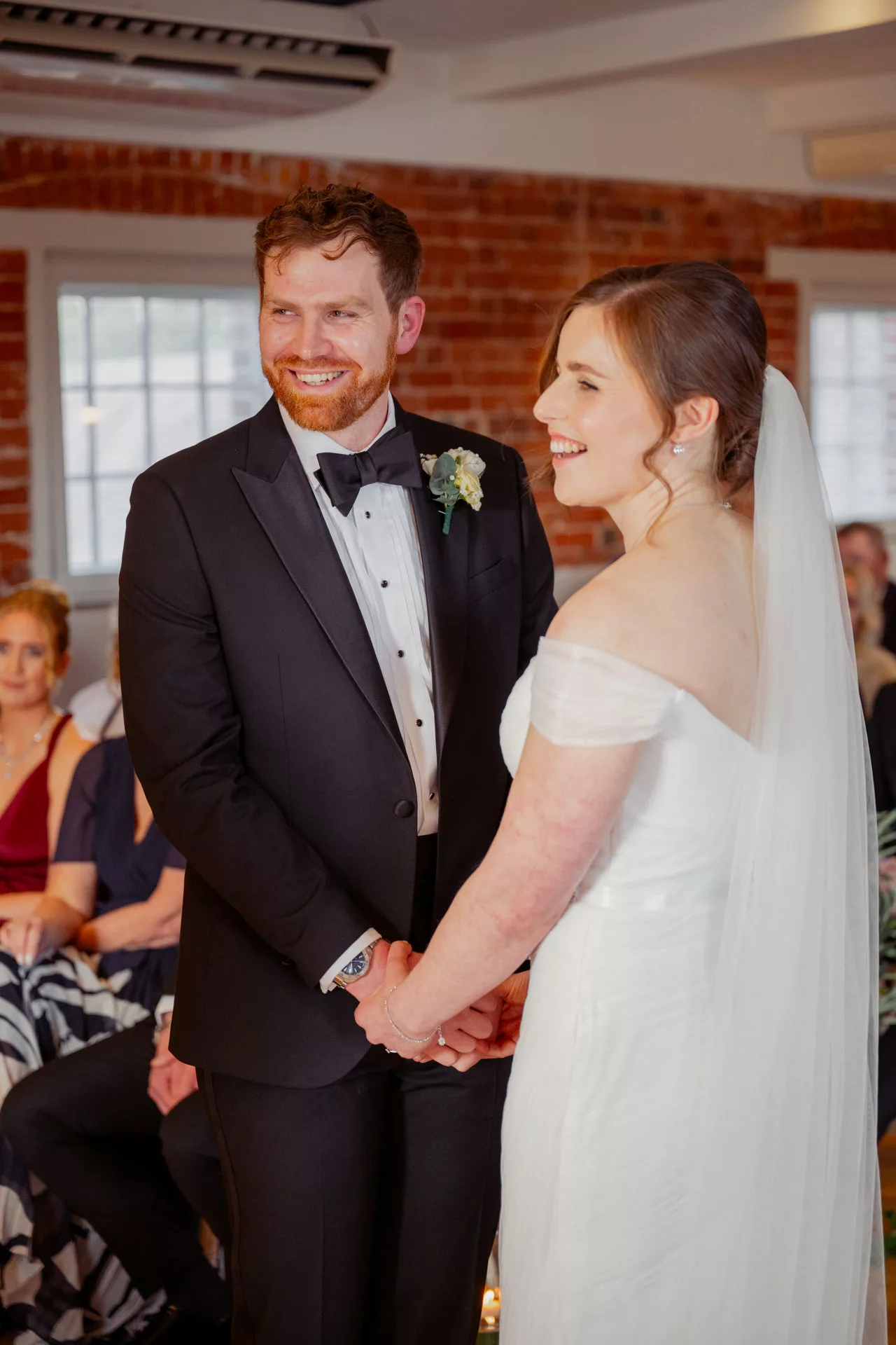 Bride & Groom inside ceremony at Sopley Mill