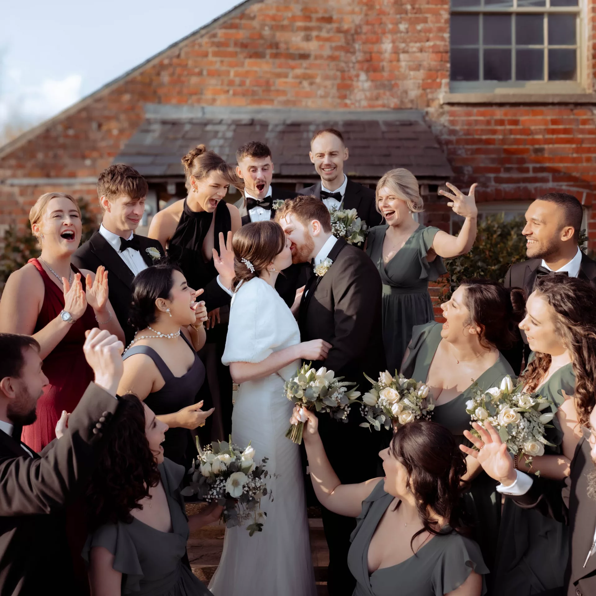 An amazing Portrait of Bride & Groom with bridal party outside in the grounds of Sopley Mill
