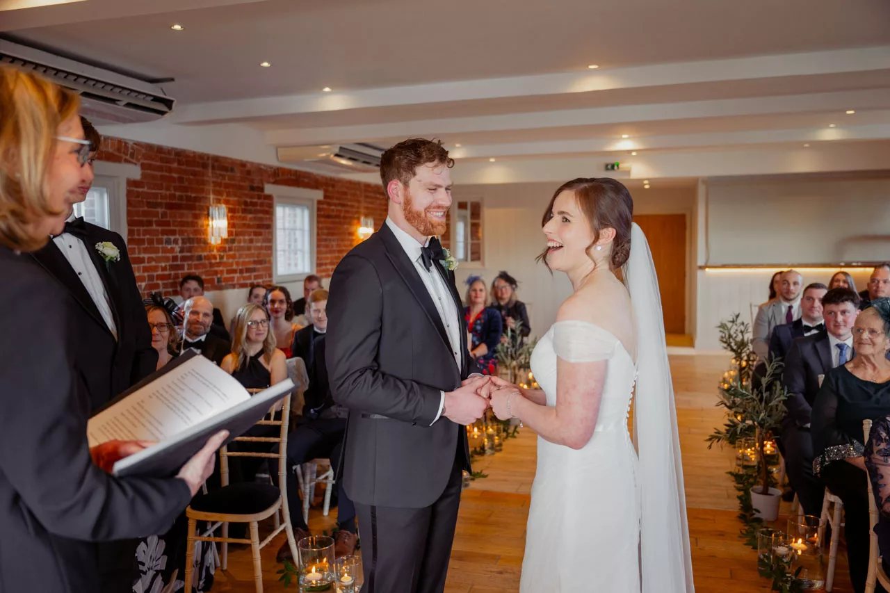 Bride & Groom inside ceremony at Sopley Mill