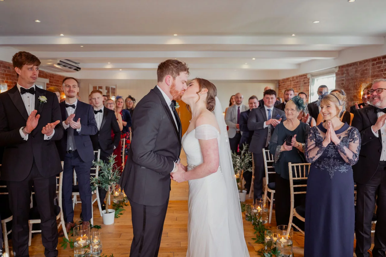 Bride & Groom inside ceremony at Sopley Mill