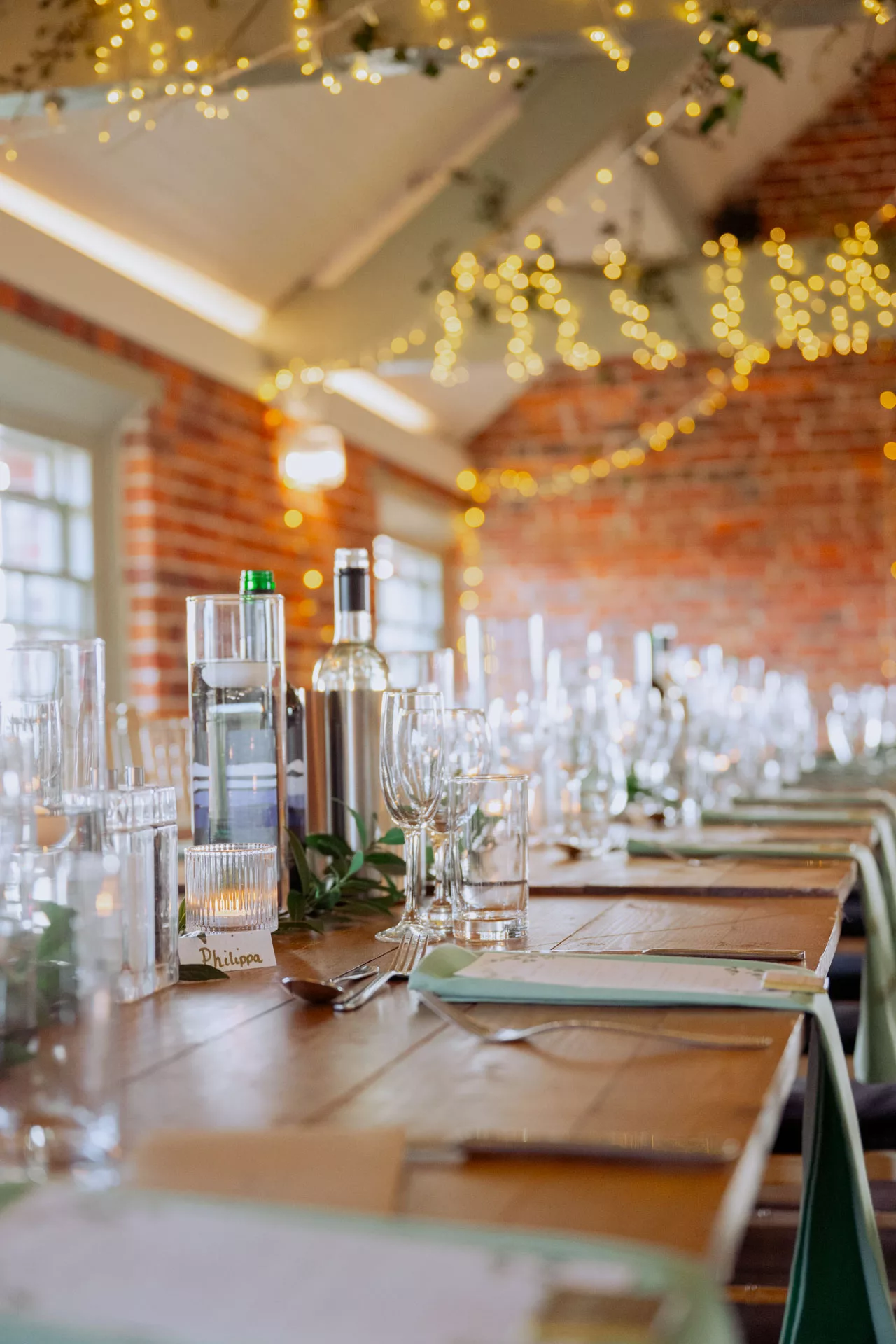 Close up of trestle tables set out for wedding breakfast at Sopley Mill 2026