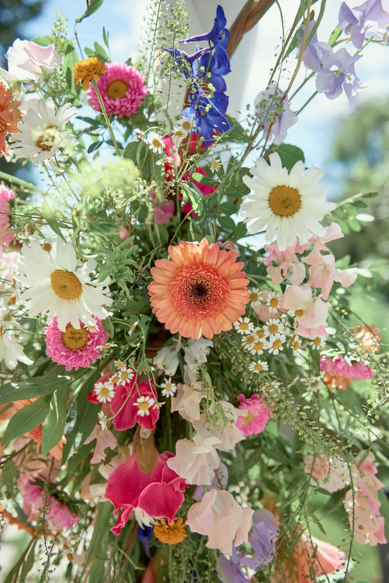 Examples of the beautiful flower armaments for the outdoor wedding ceremony at Sopley Mill 