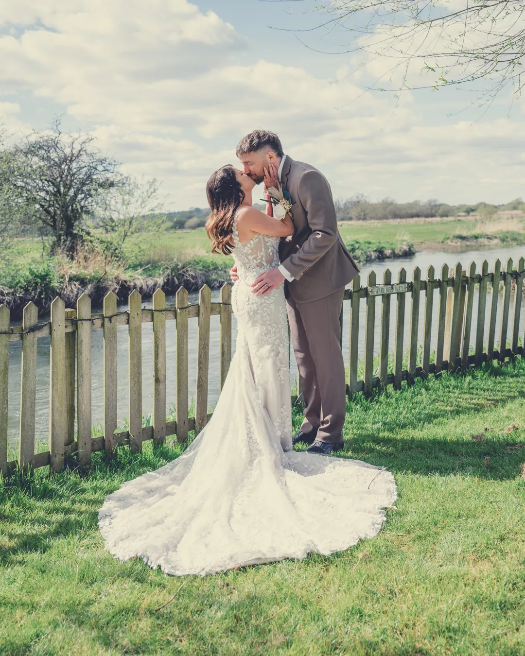 Bride and groom in the grounds of Sopley mill during a Spring wedding