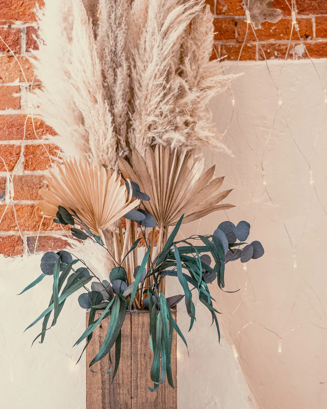 Ceremony room at Sopley Mill styled with pampas grass