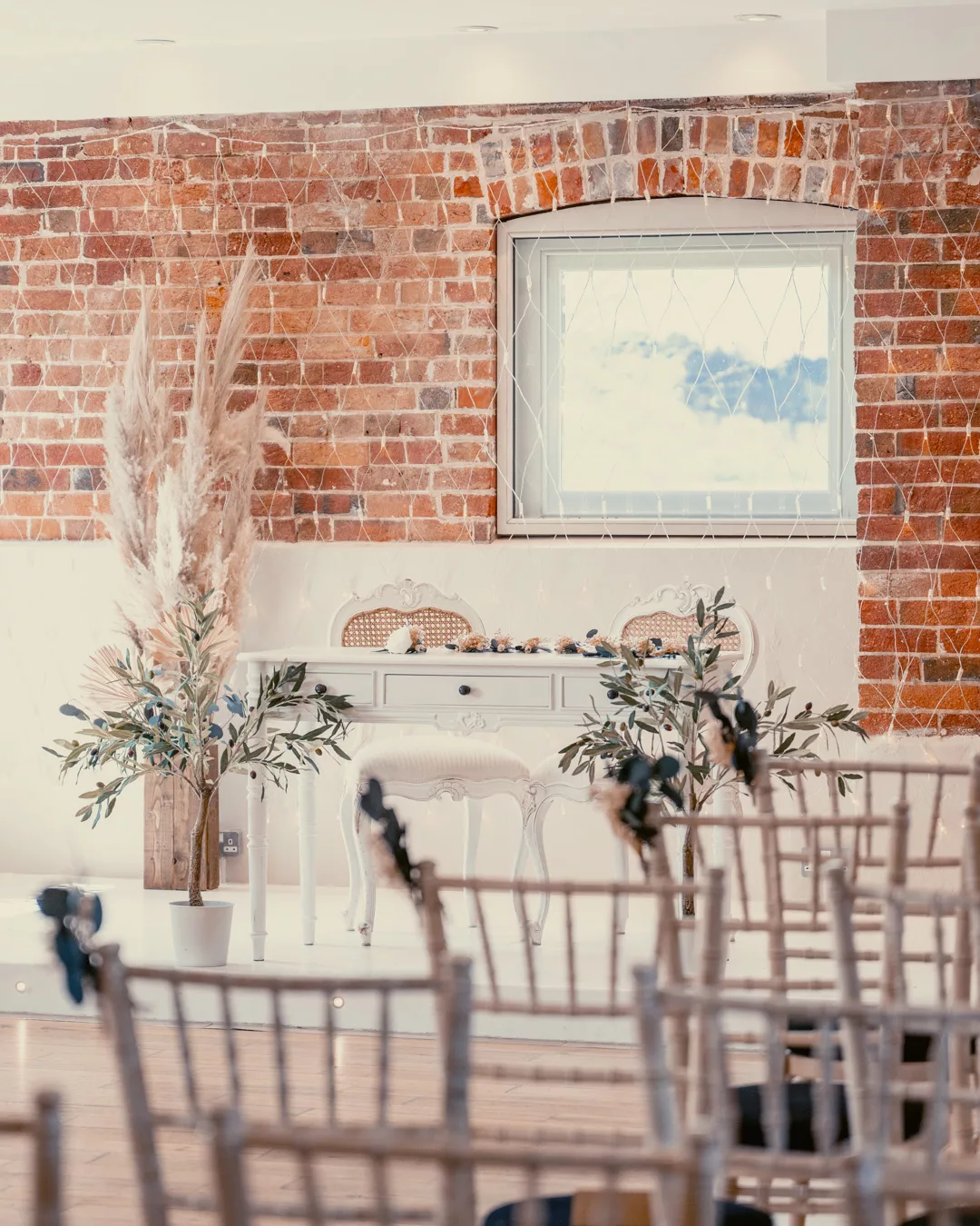 Ceremony room at Sopley Mill styled with pampas grass