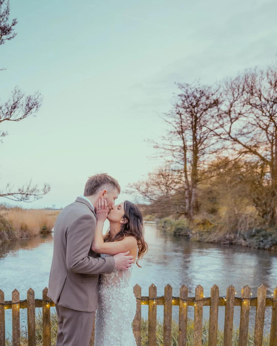 Bride and groom in the grounds of Sopley mill during a Spring wedding