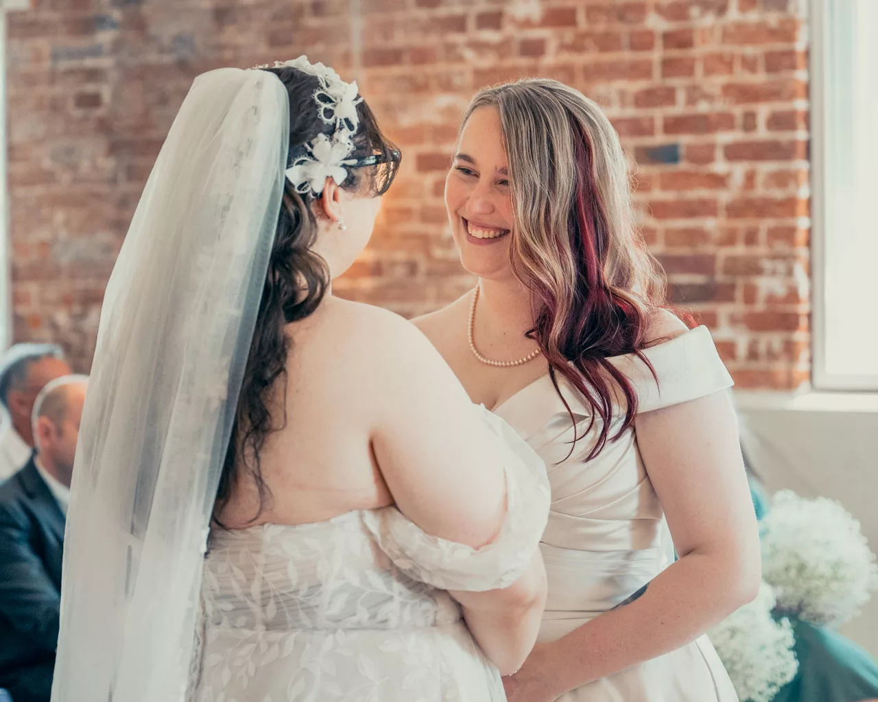 Two Brides wedding ceremony at Sopley mill