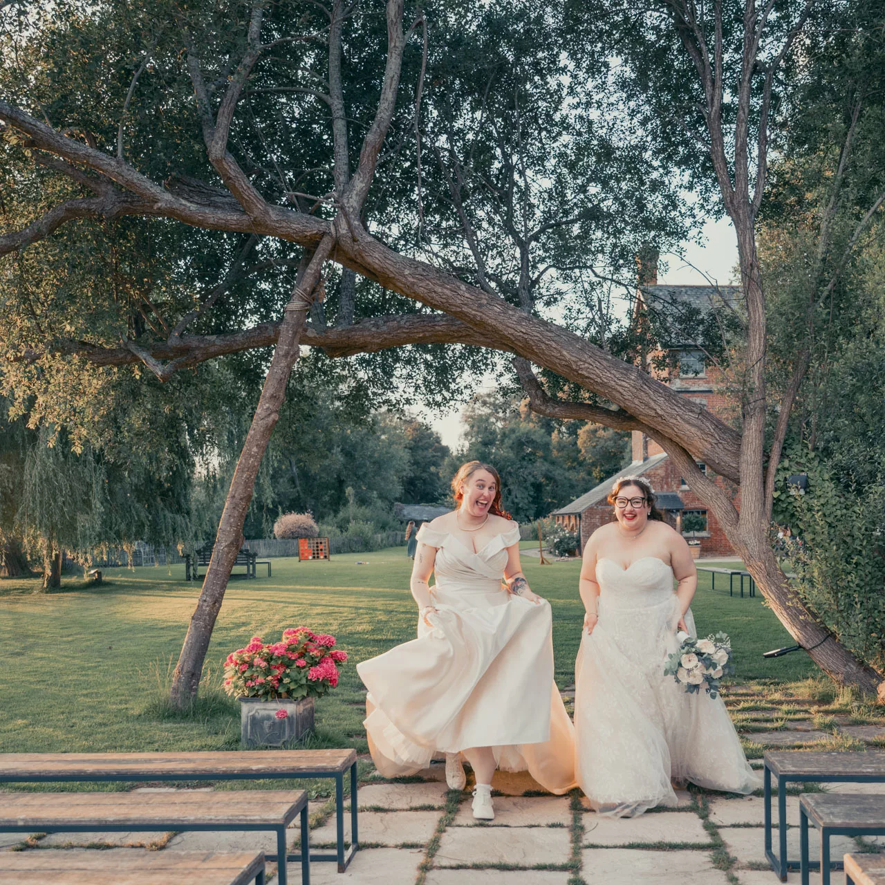Two Brides in the outside wedding area at Sopley Mill